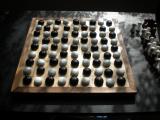 A mock up for konane using a hnefatafl board and black/white pieces.